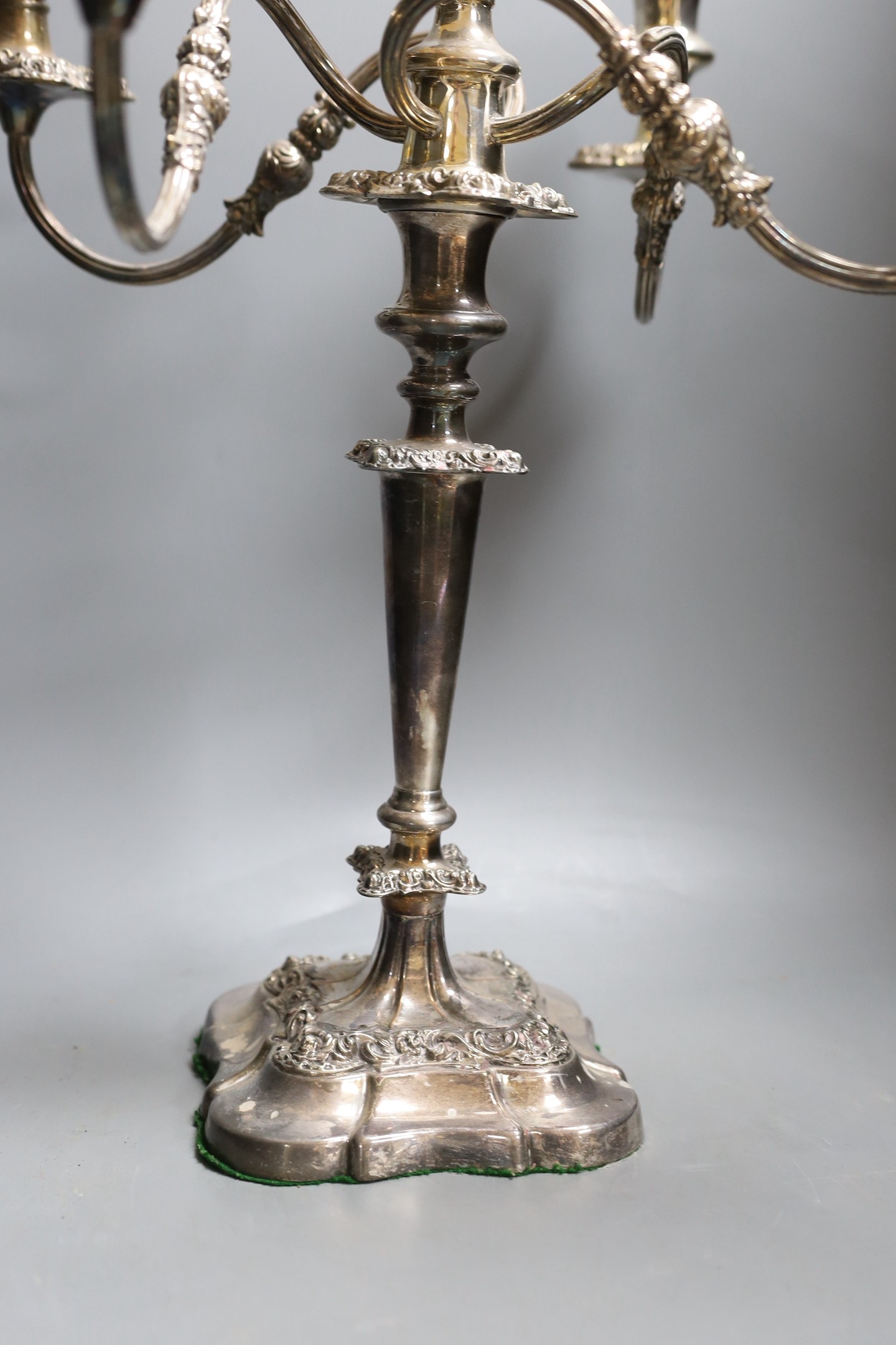 A decorative four branch plated candelabrum - 53cm tall